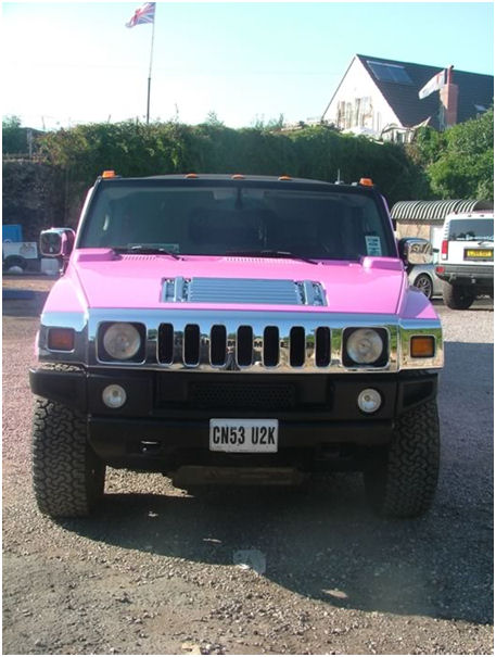 Chauffeur stretched pink Hummer H2 limo hire in Bristol, Gloucester, Cheltenham, Cardiff, Wales, Weston Super Mare, and Bath.