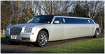 Chauffeur stretched silver Chrysler C300 Baby Bentley limo hire in Glasgow, Edinburgh, Scotland