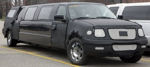 Chauffeur stretched black Jeep Expedition limousine hire in UK